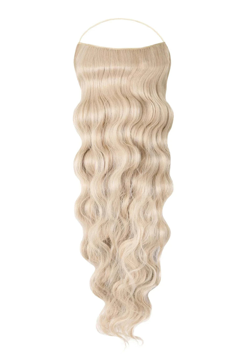 Close-up of wavy Syn Halo hair extensions made from premium Kanekalon synthetic fiber, showcasing natural look and seamless blend.