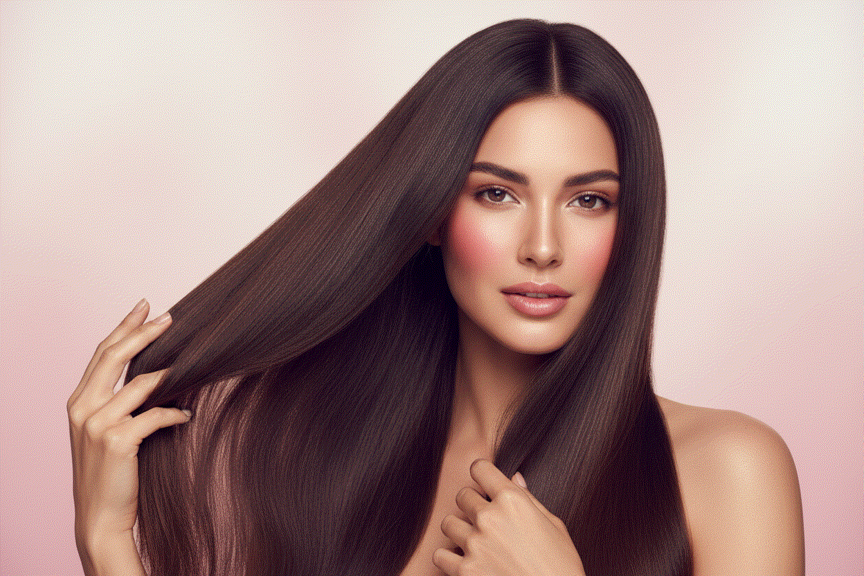 Woman caring for silky, lustrous Halo Hair Extensions with gentle detangling and hydrating shampoo