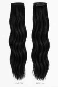 Bang Booster - Jet Black #1 clip-in hair extensions in glossy black, with long wavy strands and discreet top clips.